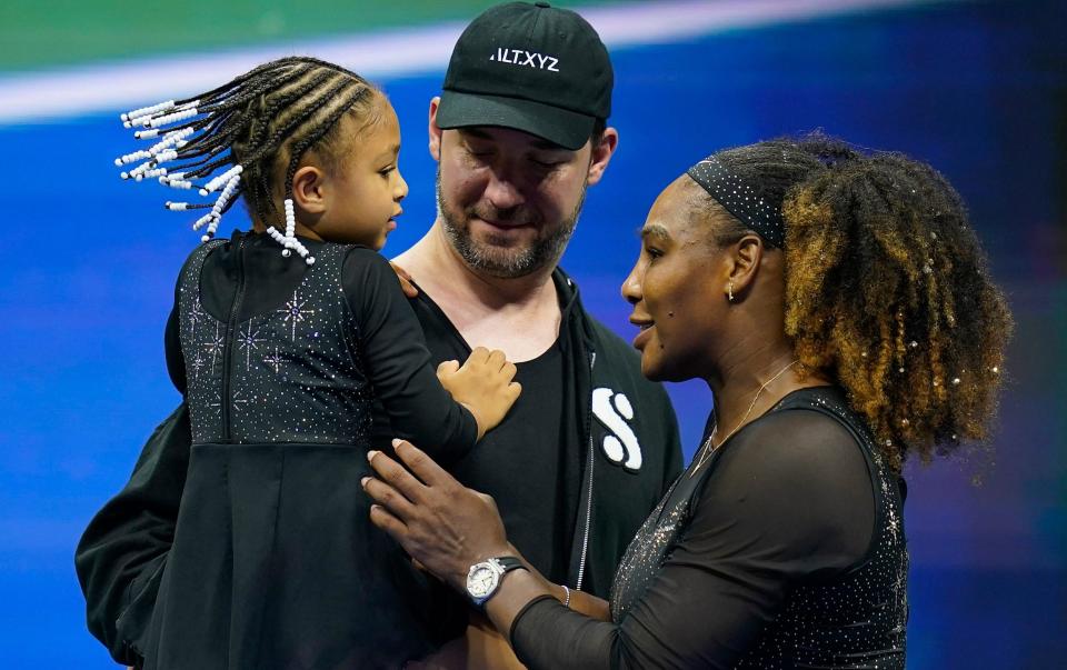 Serena Williams talks with her daughter Olympia and husband Alexis Ohanian - Charles Krupa/AP