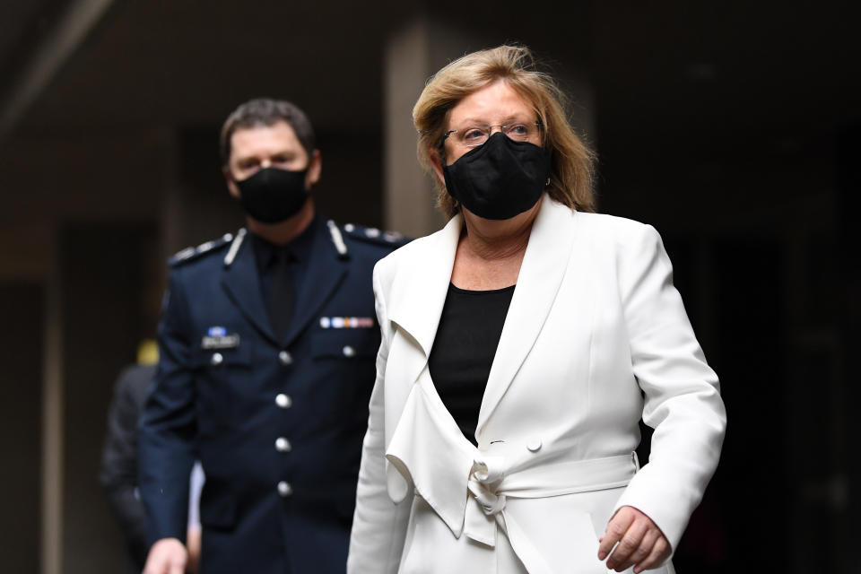 Victoria Police Minister Lisa Neville (right) arrives to the press conference Tuesday. Source: AAP