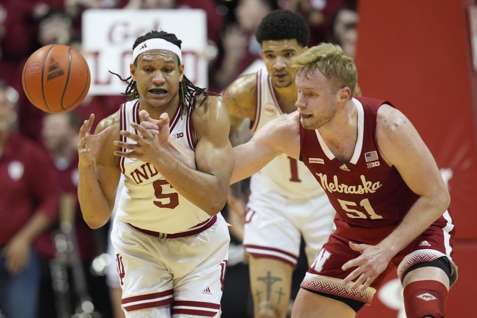 Indiana forward Malik Reneau (5) steals the ball from Nebraska forward Rienk Mast (51) during the second half of an NCAA college basketball game, Wednesday, Feb. 21, 2024, in Bloomington, Ind. (AP Photo/Darron Cummings)