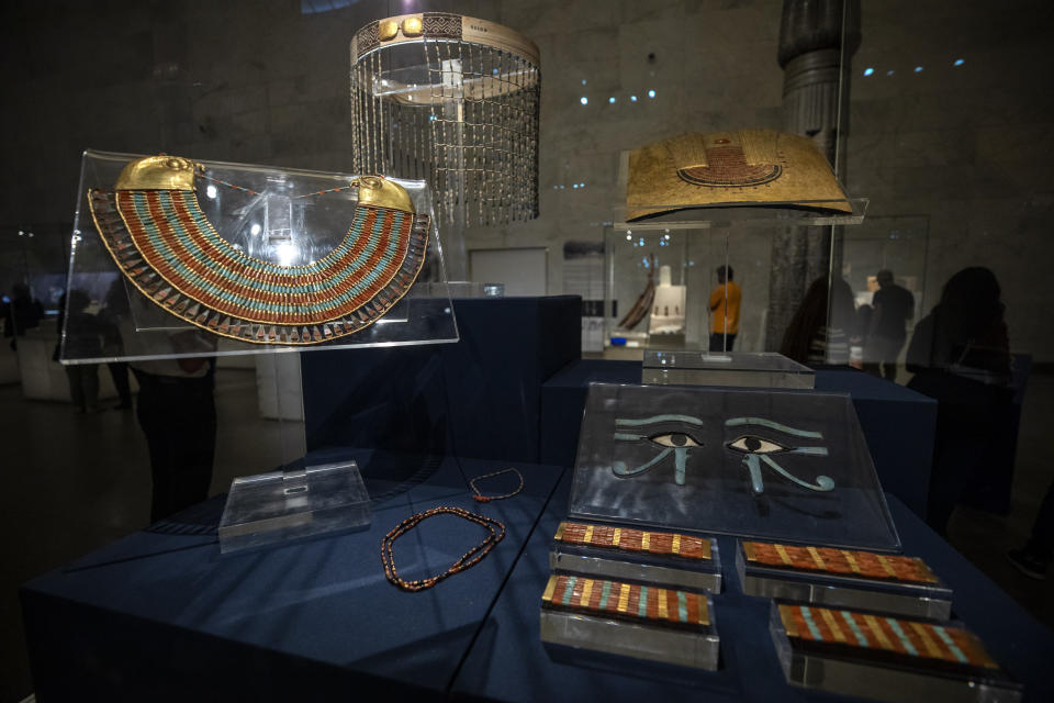 FILE - In this April 24, 2021 file photo, a collection of the jewelry of Princess Neferuptah, the daughter of King Amenemhat III, on display in its glass case at the new National Museum of Egyptian Civilization in Old Cairo. As some European countries re-open to international tourists, Egypt has already been trying for months to attract them to its archaeological sites and museums. Officials are betting that the new ancient discoveries will set it apart on the mid- and post-pandemic tourism market(AP Photo/Nariman El-Mofty, File)