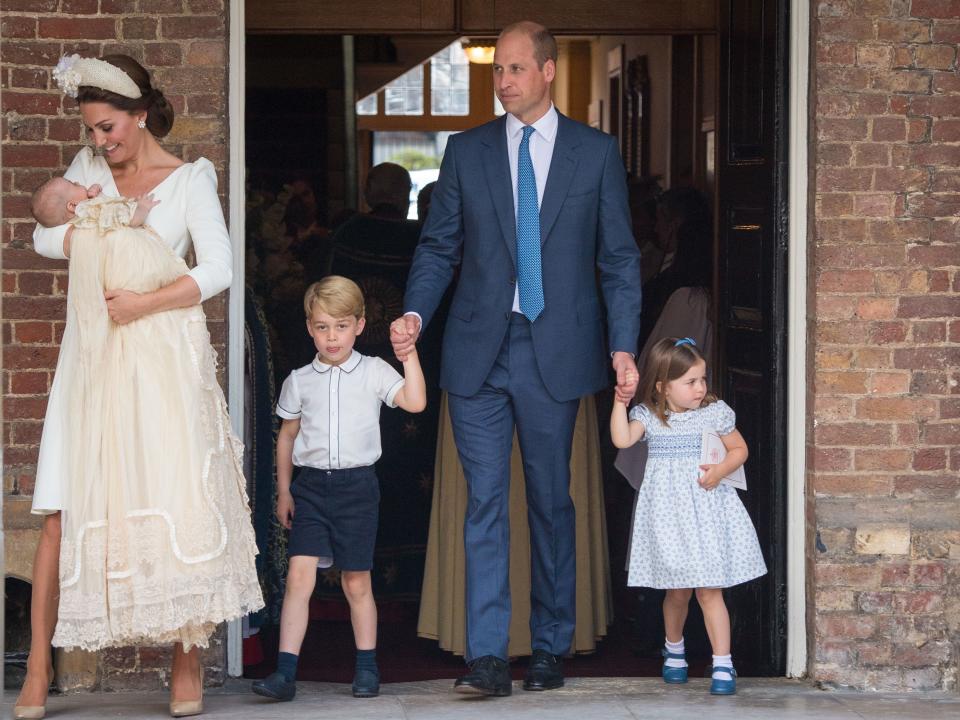 Kate Middleton, Prince William, Prince George, and Princess Charlotte at Prince Louis's christening in 2018.