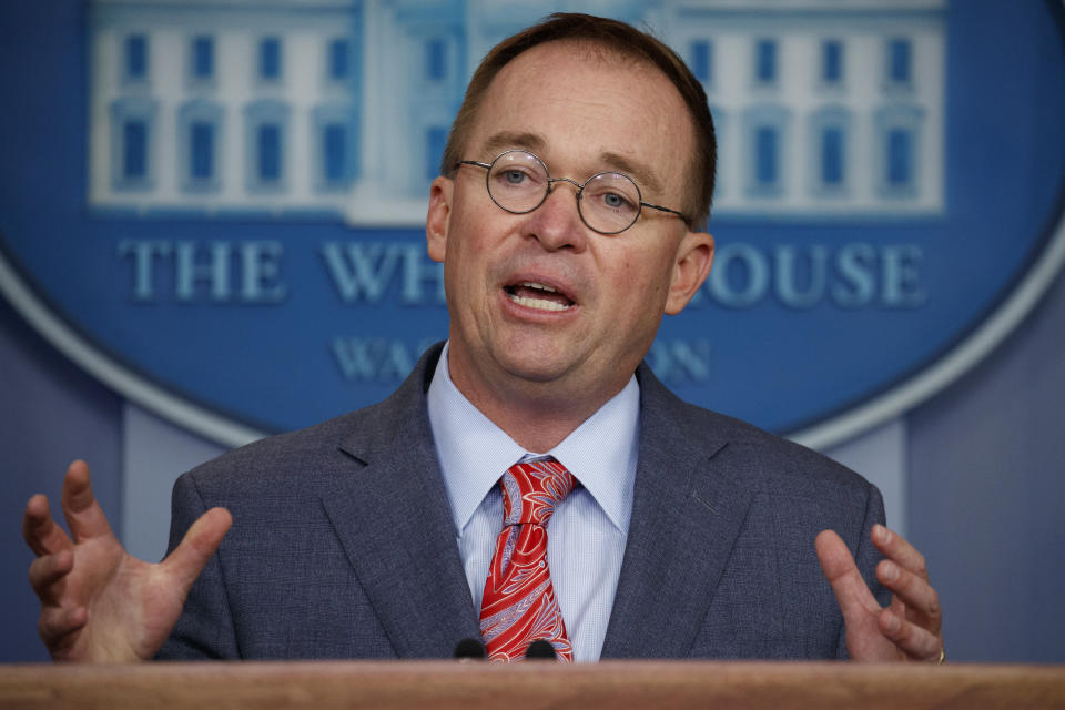 Acting White House chief of staff Mick Mulvaney speaks to reporters at the White House on Thursday. (Evan Vucci/AP)