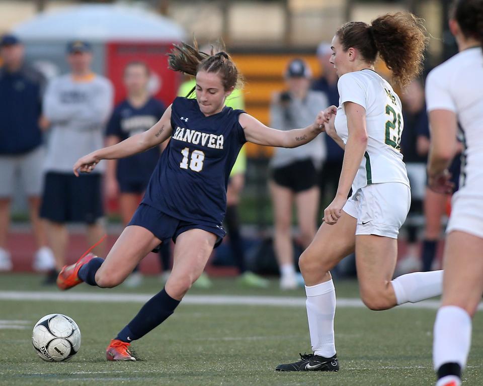 Hanover’s Sophie Schiller looks to send the ball upfield during second half action of the Division 3 Elite 8 game against North Reading at Hanover High School on Saturday, Nov. 12, 2022.