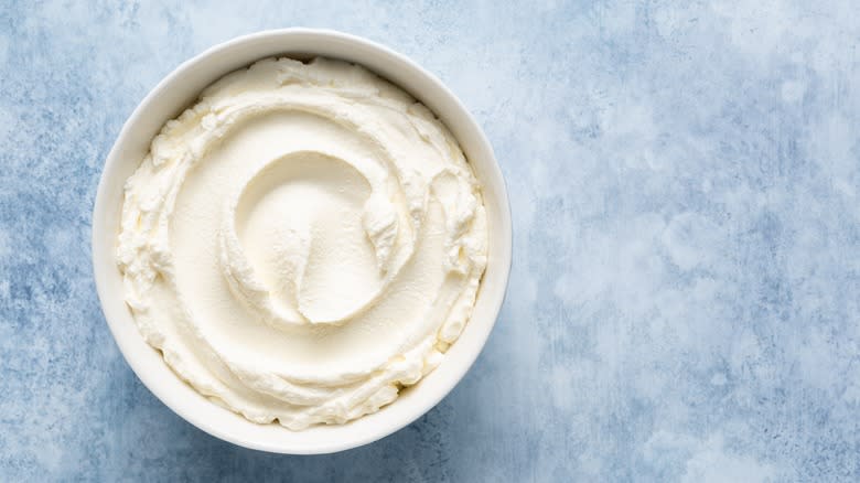 Cream in white bowl