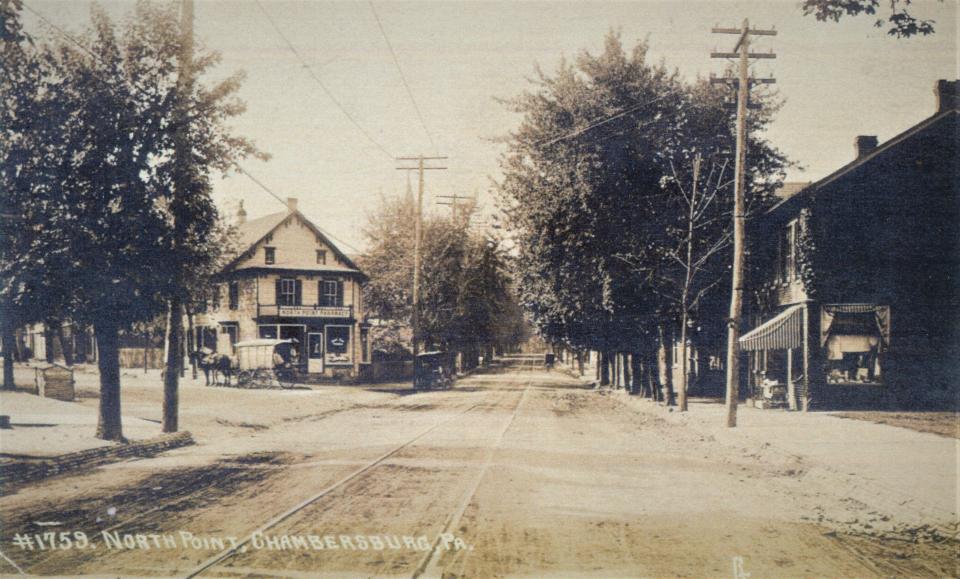 This is what the north point area looked like in the early 20th century. The building in the center is located approximately where the current building stands at 370 Philadelphia Ave., Chambersburg. The street in the center becomes North Main Street, looking south toward the square. At this time, the building seen here was home to North Point Pharmacy (a horse-and-wagon for deliveries can be seen in front). The property was again home to a later version of the pharmacy a century later.