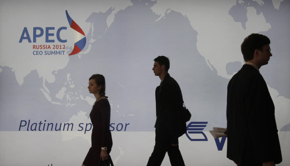 Delegates arrive on the opening morning of presentations at the APEC summit in Vladivostok, Russia, Friday, Sept. 7, 2012. (AP Photo/Ahn Young-joon)