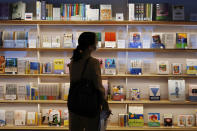 Books of Haruki Murakami are displayed at the university's new international house of literature as known as The Haruki Murakami Library at Waseda University Wednesday, Sept. 22, 2021 in Tokyo. The new literary center opening next month on the university campus is no ordinary kind. It's designed by renowned Japanese architect Kengo Kuma and featuring the world of Murakami and his works. (AP Photo/Eugene Hoshiko)