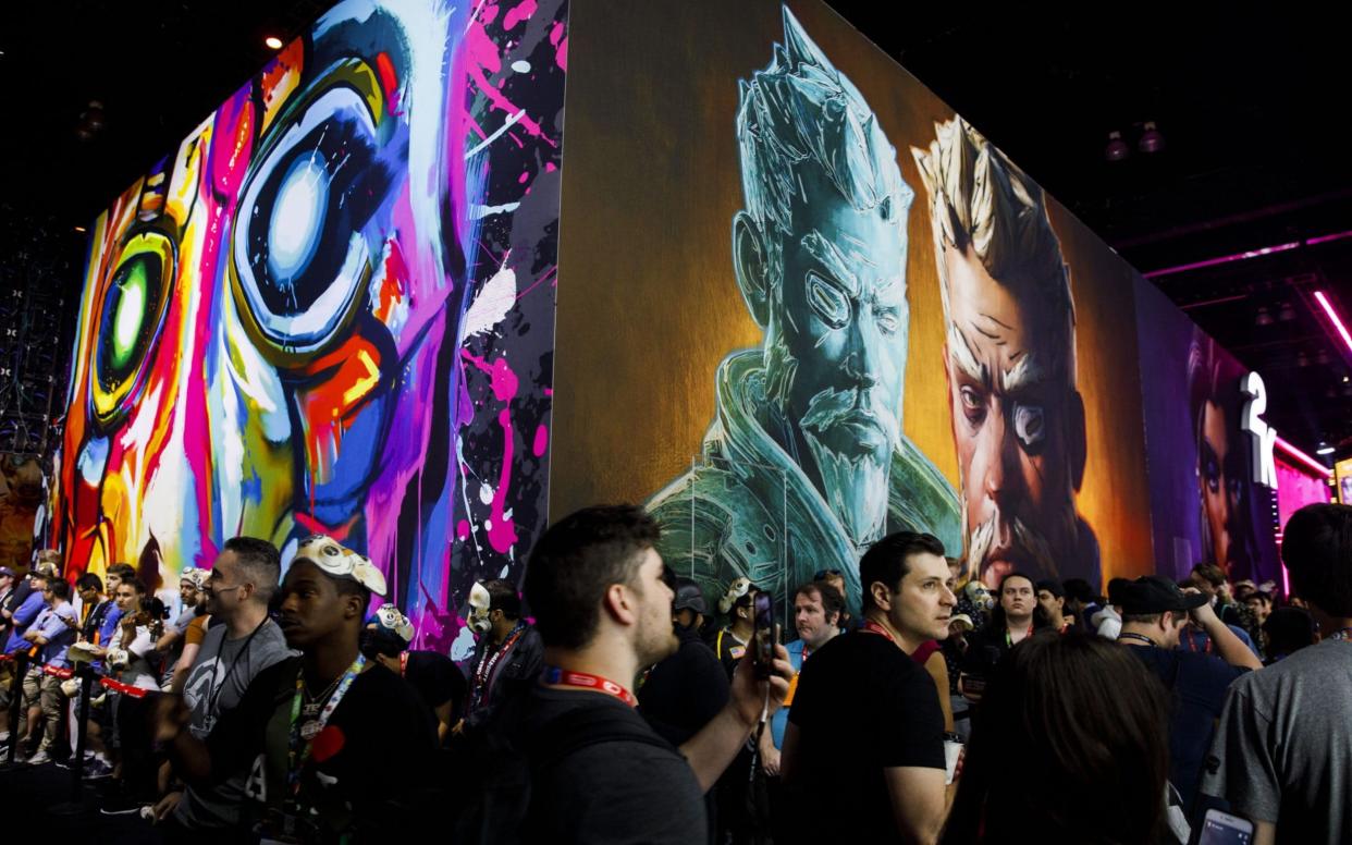 Attendees walk past the Borderlands 3 stand at E3 2019 - Bloomberg