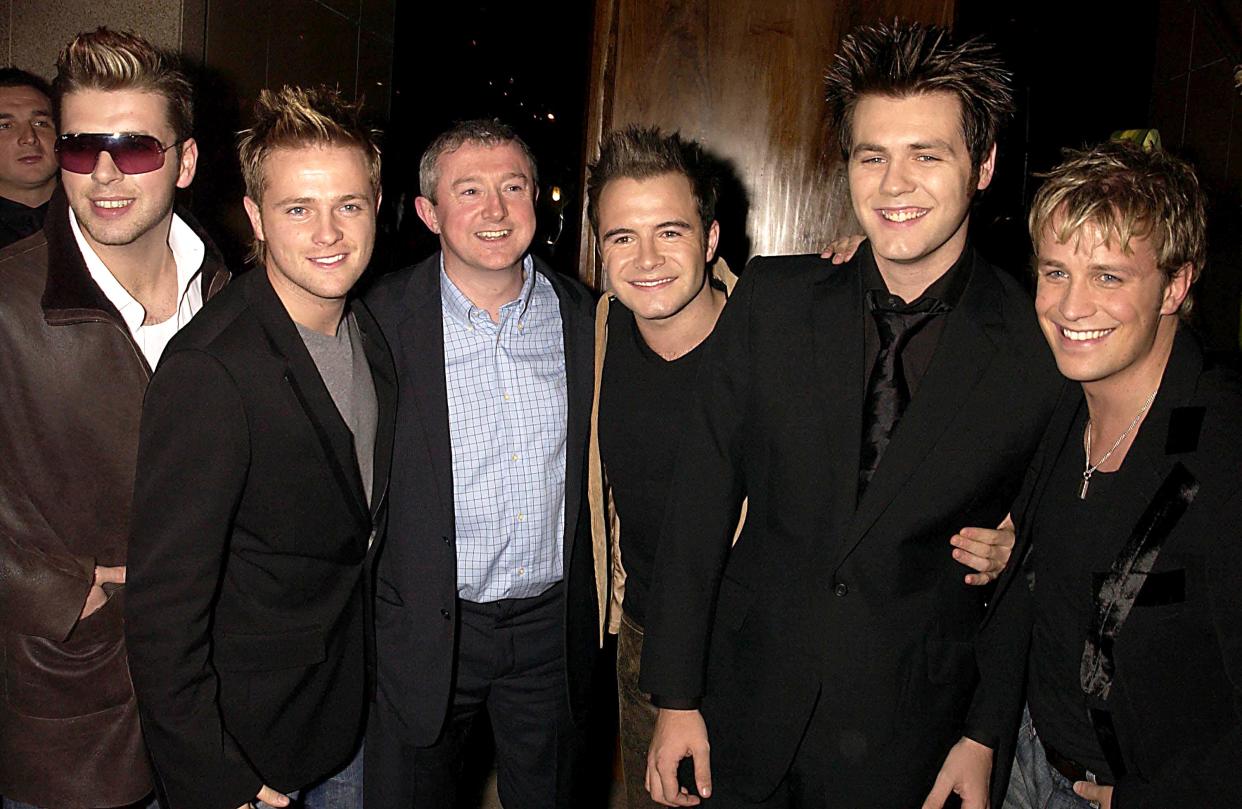 UNITED KINGDOM - NOVEMBER 12:  Westlife With Louis Walsh (westlife Manager), Westlife Celebrated Their Guinness Book Of Records Entry For The Most Public Appearnces In 36 Hours By A Pop Group With A Party At Zuma Restaurant In London  (Photo by Dave Benett/Getty Images)