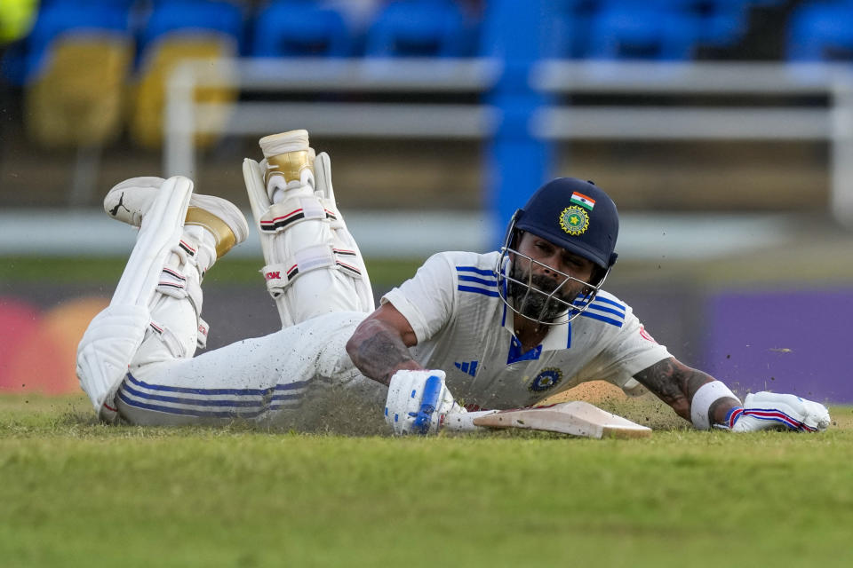 India's Virat Kohli safely makes his ground on day one of the second cricket Test match against West Indies at Queen's Park in Port of Spain, Trinidad and Tobago, Thursday, July 20, 2023. (AP Photo/Ricardo Mazalan)