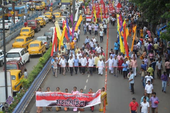 Activists participate in a world peace rally and protest against the arrest of five human rights activists—Arun Ferreira, Sudha Bharadwaj, Gautam Navlakha, Vernon Gonsalves, and P. Varavara Rao—in connection with the Bhima-Koregaon violence by Maharashtra Police on Sept. 1, 2018 in Kolkata.<span class="copyright">Debajyoti Chakraborty—NurPhoto/Getty Images</span>