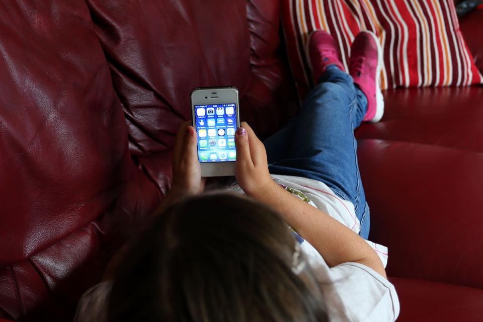 It is thought that blue light from smartphone and other devices supresses the secretion of melatonin (Peter Byrne/PA) (PA Archive)