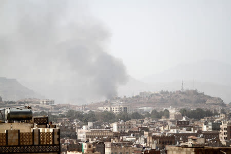 Smoke rises after an airstrike in Sanaa, Yemen March 22, 2018. REUTERS/Mohamed al-Sayaghi