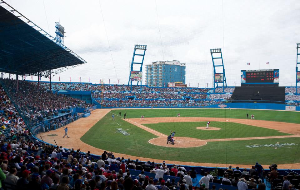 The Tampa Bay Rays play Cuba's national baseball team at Estadio Latinoamericano in Havana, Cuba, in 2016 as then-President Barack Obama and his family watch the game with Cuba's President Raul Castro.