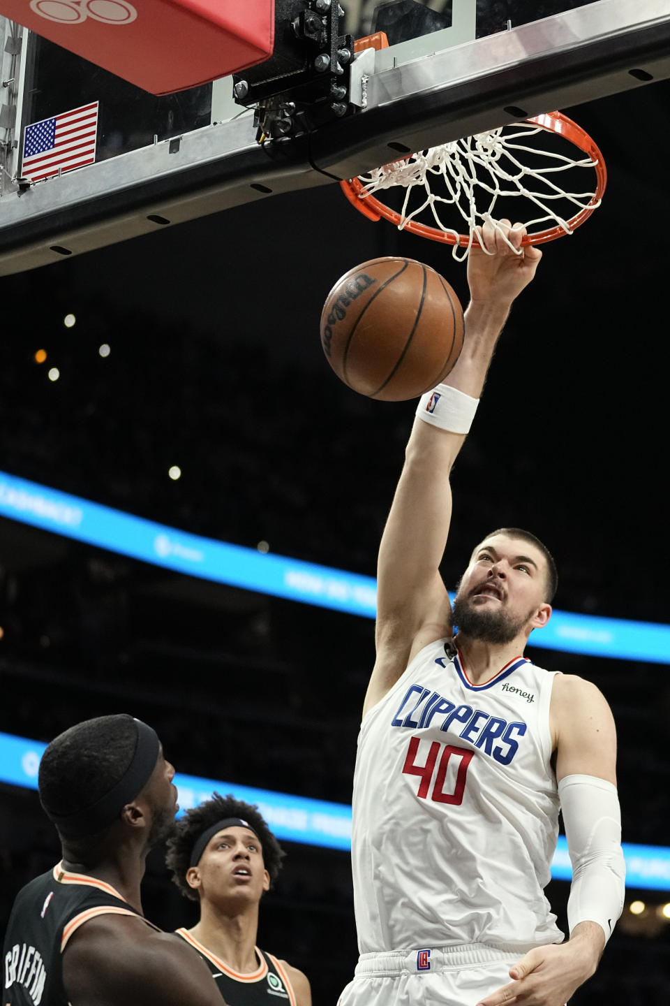 Los Angeles Clippers center Ivica Zubac (40) scores during the first half of an NBA basketball game against the Atlanta Hawks, Saturday, Jan. 28, 2023, in Atlanta. (AP Photo/John Bazemore)