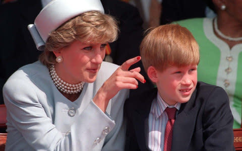  Diana, Princess of Wales with her son Prince Harry - Credit: PA