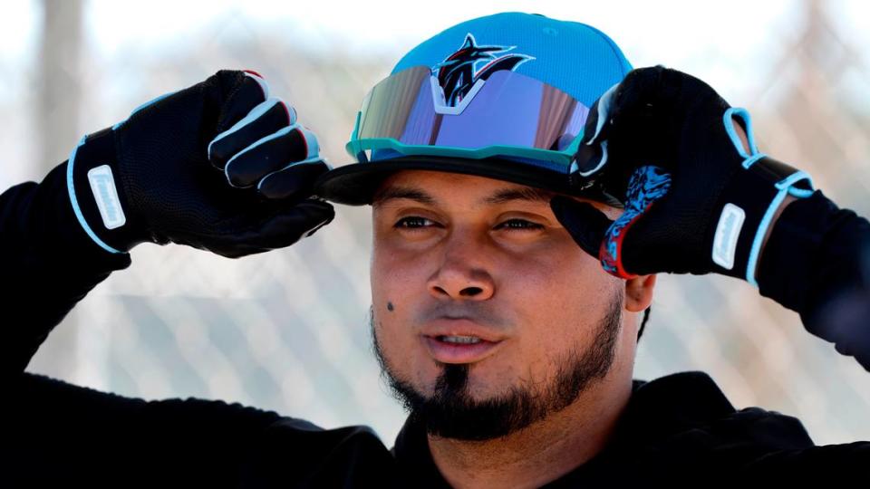 Miami Marlins second baseman Luis Arraez adjusts his hat during Miami Marlins spring training at Roger Dean Chevrolet Stadium in Jupiter, Florida on Tuesday, February 20, 2024.