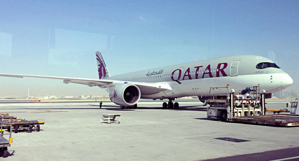 A Qatar plane at the airport