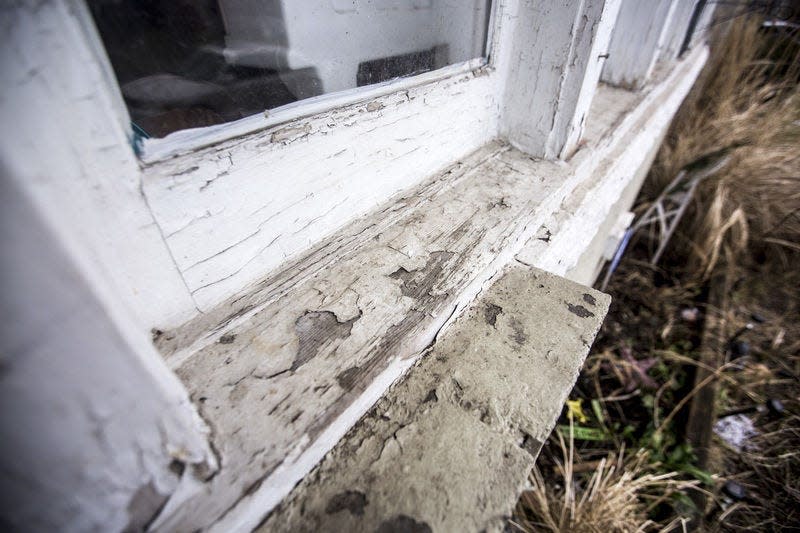 A new Indiana state law taking effect in July will require health care providers to test children under 6 for lead. In this South Bend Tribune photo, children can be exposed to deteriorating lead paint in old homes.