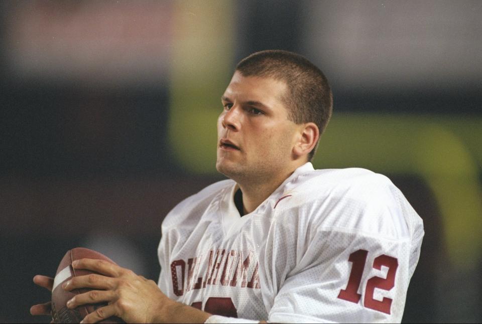 Sept. 21, 1996: Quarterback Justin Fuente of the Oklahoma Sooners looks on during a game against the San Diego State Aztecs at Jack Murphy Stadium in San Diego, California. San Diego State won the game 51-31. Todd Warshaw /Allsport