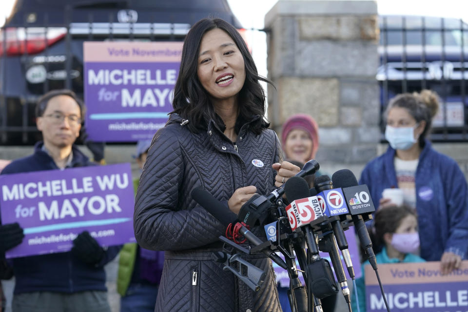 Boston mayoral candidate Michelle Wu faces reporters after casting her ballot at a polling station, Tuesday, Nov. 2, 2021, in the Roslindale neighborhood, of Boston. Boston voters are heading to the polls Tuesday to choose between Democrats Michelle Wu and Annissa Essaibi George for mayor. (AP Photo/Steven Senne)