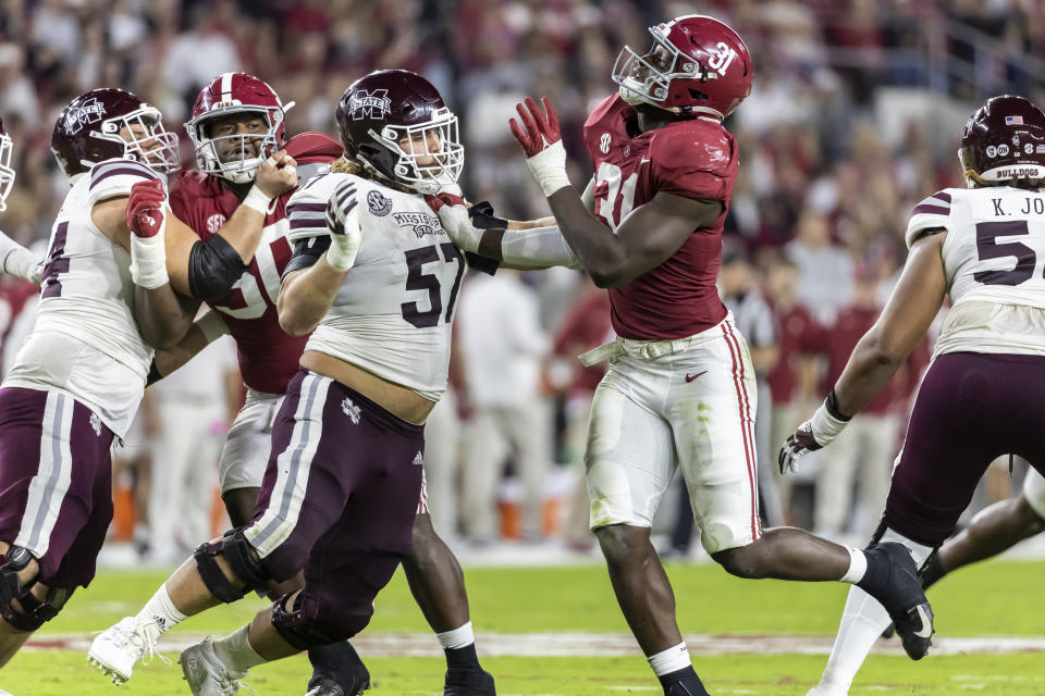 Mississippi State offensive lineman Cole Smith (57) works against Alabama linebacker Will Anderson Jr. (31) during the second half of an NCAA college football game Saturday, Oct. 22, 2022, in Tuscaloosa, Ala. (AP Photo/Vasha Hunt)