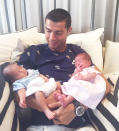 <p>"So happy to be able to hold the two new loves of my life," <span>Ronaldo captioned this snap</span>, in which the twins are sound asleep in their dad's arms.</p>