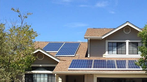 Solar panels installed by SolarCity on a residential rooftop in California.