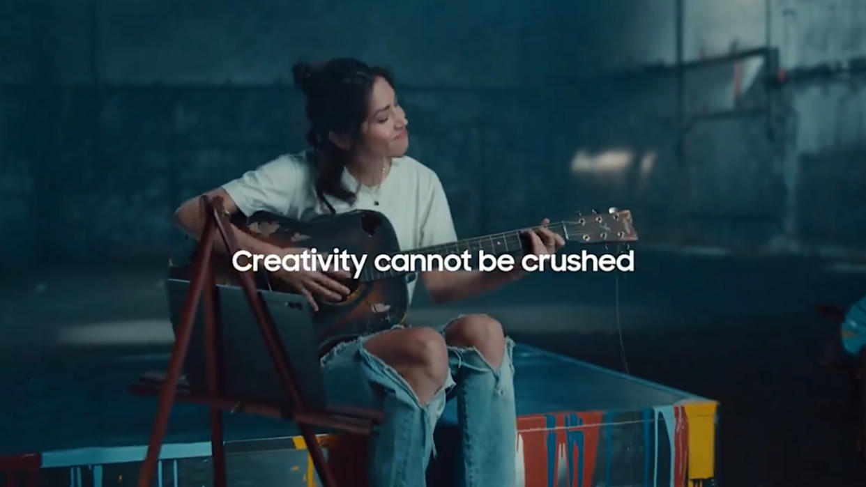  Samsung "UnCrush" advert reply to Apple's "Crush!" advert, woman playing guitar. 