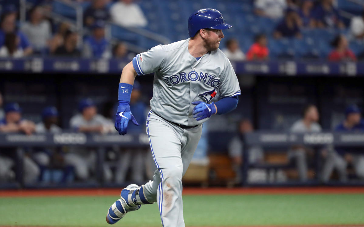 Toronto Blue Jays first baseman Justin Smoak (14) and Toronto Blue