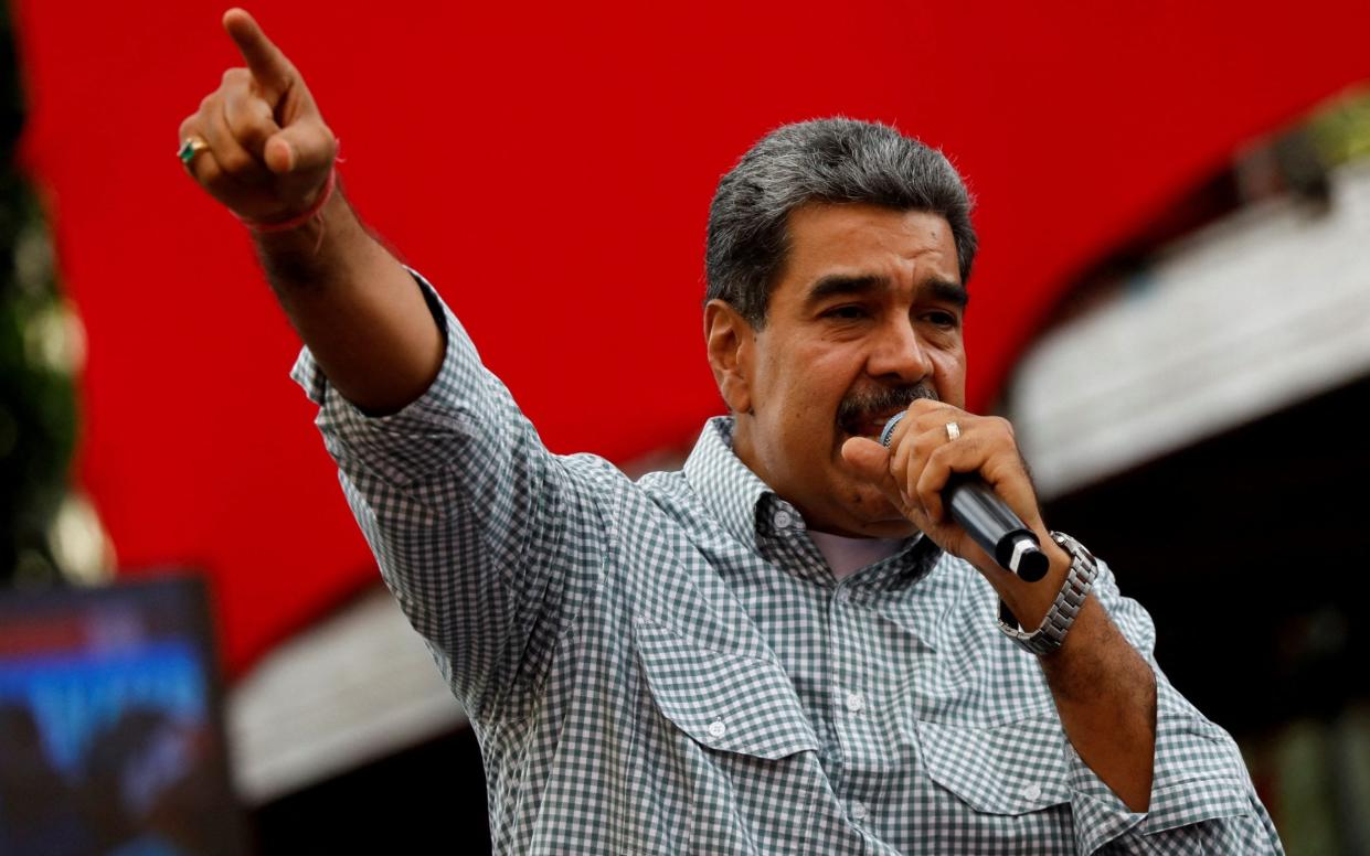 President Nicolas Maduro speaks at a rally in Caracas to celebrate the results of the presidential election