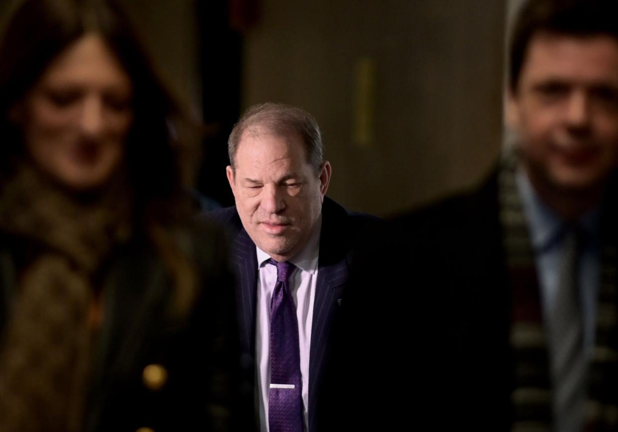 Harvey Weinstein arrives with his defense attorneys Donna Rotunno, left, and Damon Cheronis, right, at the Manhattan Criminal Court, on Feb. 19, 2020, in New York City. Jurors in ex-Hollywood titan Harvey Weinstein's high-profile sex-crimes trial ended their first day of deliberations on Feb. 18, 2020, without reaching a verdict in the case seen as a watershed in the #MeToo movement.