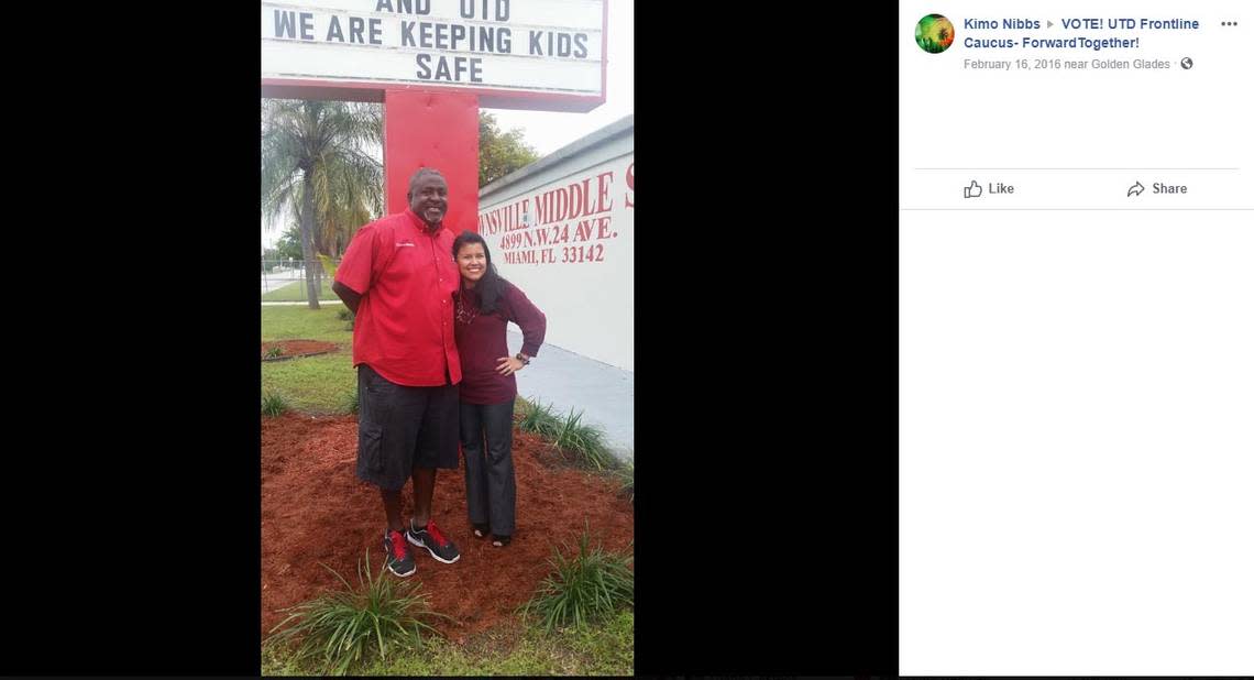 Former Brownsville Middle School physical education teacher Wendell Nibbs poses with United Teachers of Dade President Karla Hernandez-Mats in front of Brownsville’s marquee in a photo Nibbs posted to UTD’s Frontline caucus Facebook page. Nibbs posted the photo while under investigation for groping a fellow teacher.