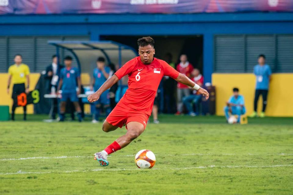 Singapore defender Nur Adam in action at the 2023 SEA Games football competition. (PHOTO: SNOC/Eng Chin An)