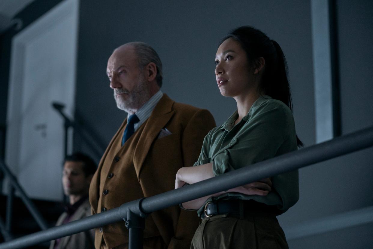 (L-R): Liam Cunningham as Wade and Jess Hong as Jin in episode 8 of <em>3 Body Problem</em>.<span class="copyright">Ed Miller—Netflix</span>