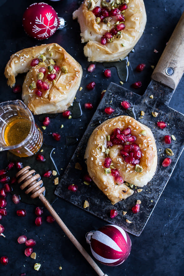 <strong>Get the <a href="http://www.halfbakedharvest.com/goat-cheese-stuffed-phyllo-swirls-pomegranate-honey-pistachios/">Goat Cheese Stuffed Phyllo Swirls with Pomegranate Honey and Pistachios recipe</a>&nbsp;from Half Baked Harvest</strong>