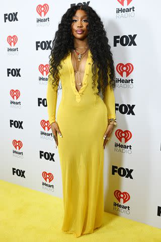 <p>Gilbert Flores/Billboard via Getty</p> SZA at the iHeartRadio Music Awards in Los Angeles on April 1, 2024