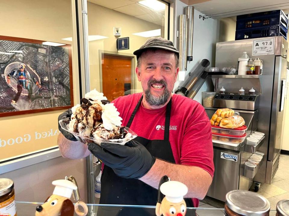 Blake Anderson holds a Mount Katahdin ice cream sundae at Nor’East Family Treats & Eats. Philip Freeman/CharlotteFive