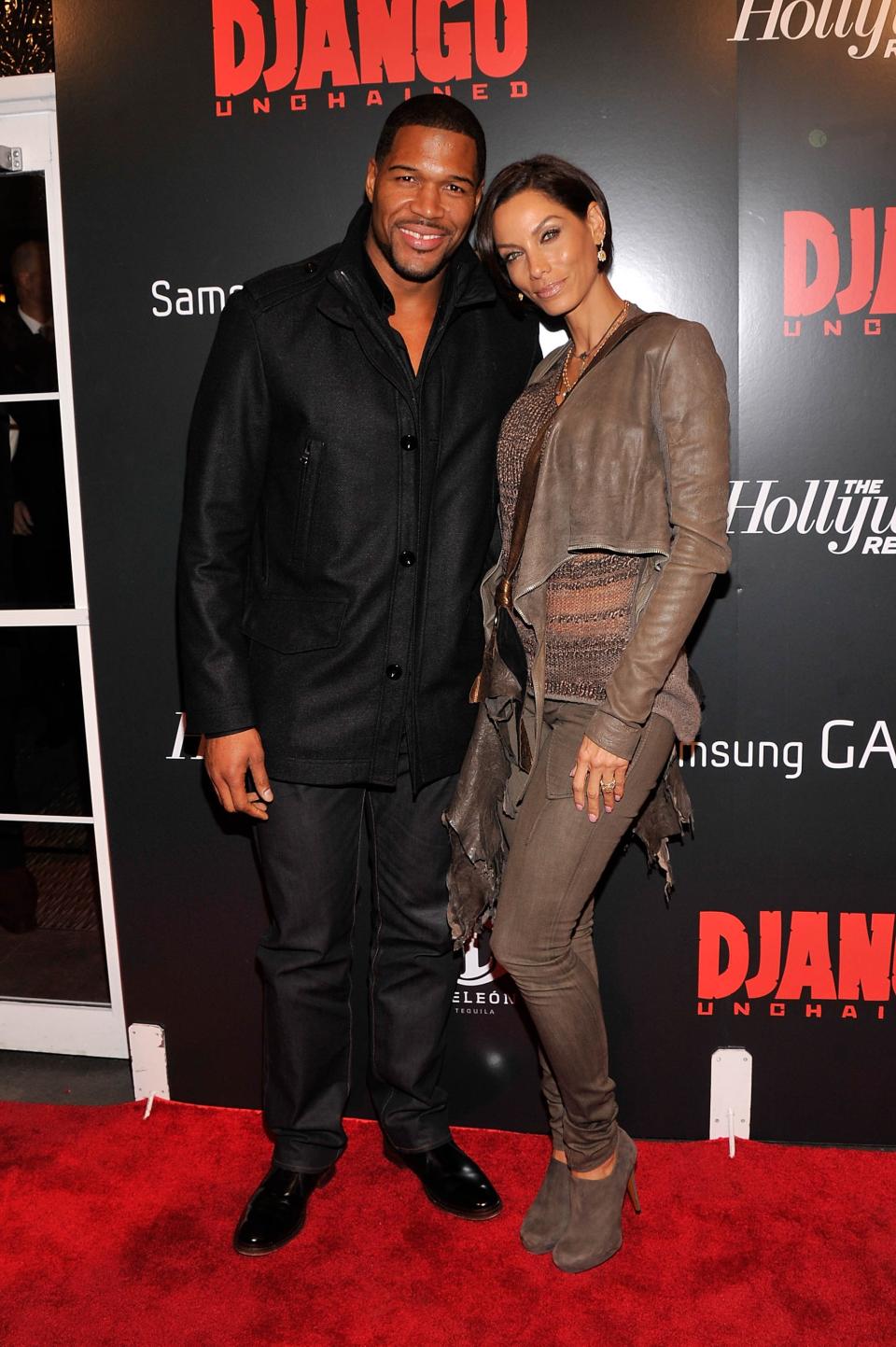 NEW YORK, NY - DECEMBER 11: Michael Strahan and Nicole Murphy attends a screening of "Django Unchained" hosted by The Weinstein Company with The Hollywood Reporter, Samsung Galaxy and The Cinema Society at Ziegfeld Theater on December 11, 2012 in New York City. (Photo by Stephen Lovekin/Getty Images)