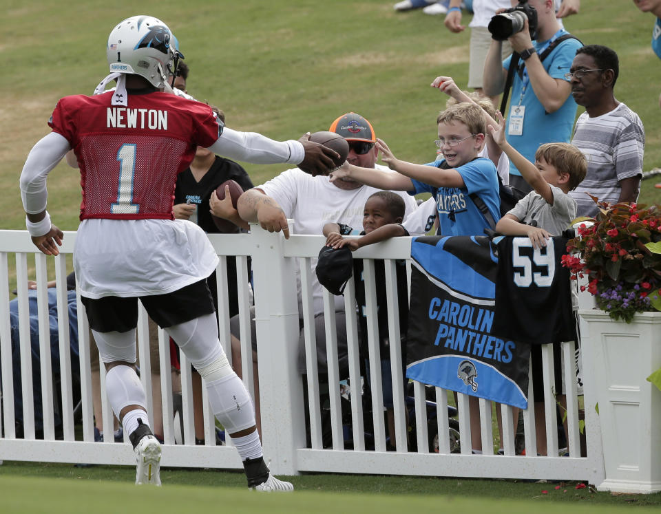 Cam Newton and the Carolina Panthers are one of 12 NFL teams that still hold training camp away from their team facility. The Panthers have camp at Wofford College. (AP)