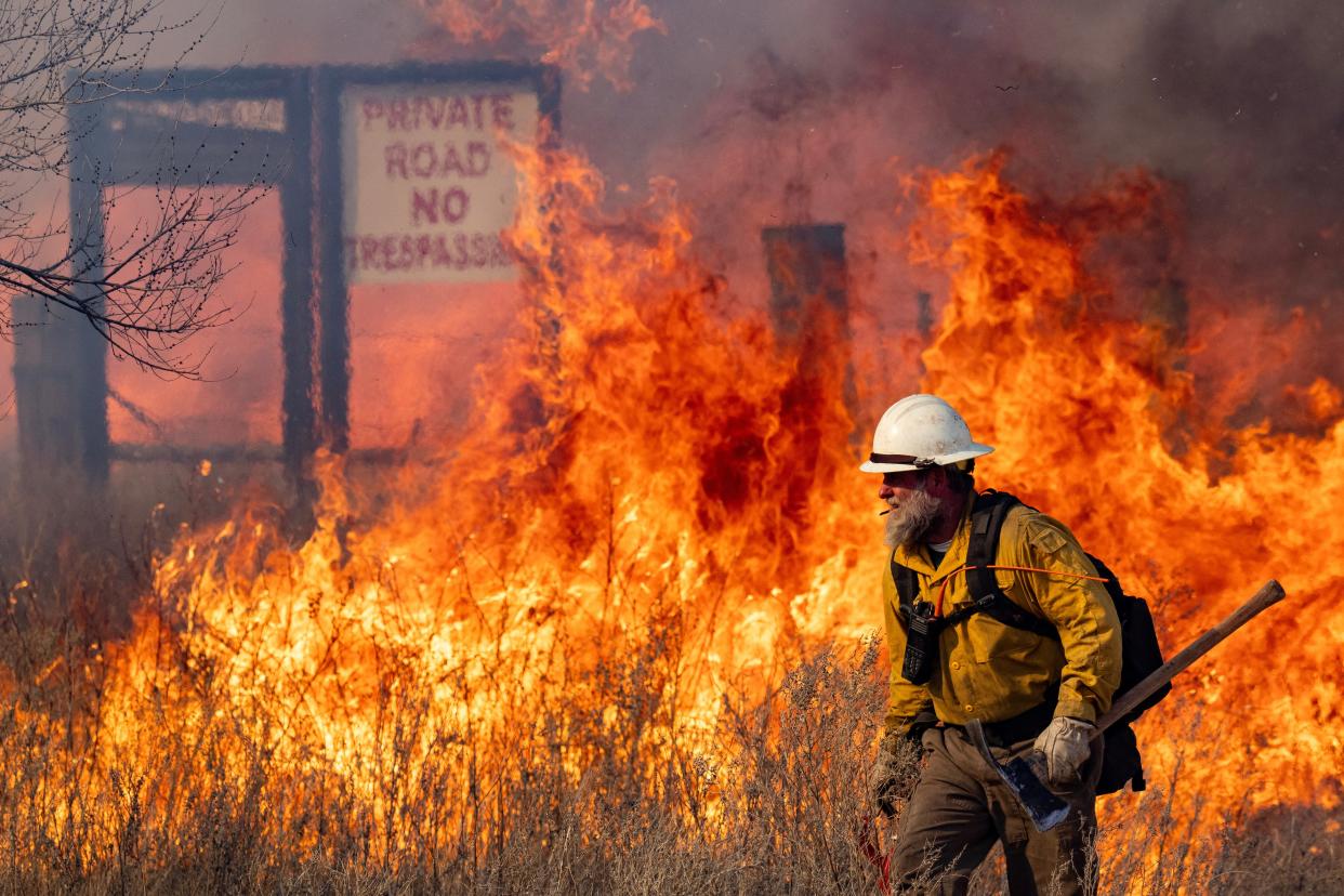 Firefighters battle parts of the reignited Smokehouse Creek fire outside of Miami, Texas in March 2024.