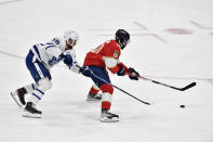 Toronto Maple Leafs defenseman Erik Gustafsson chases Florida Panthers left wing Anthony Duclair (10) during the second period of Game 3 of an NHL hockey Stanley Cup second-round playoff series, Sunday, May 7, 2023, in Sunrise, Fla. (AP Photo/Michael Laughlin)