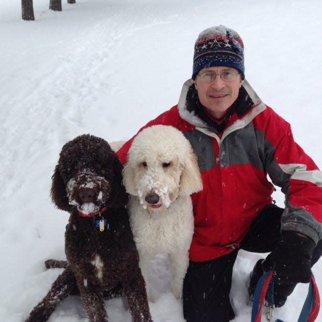 John O'Brien with his dogs Guinness and Jersey.