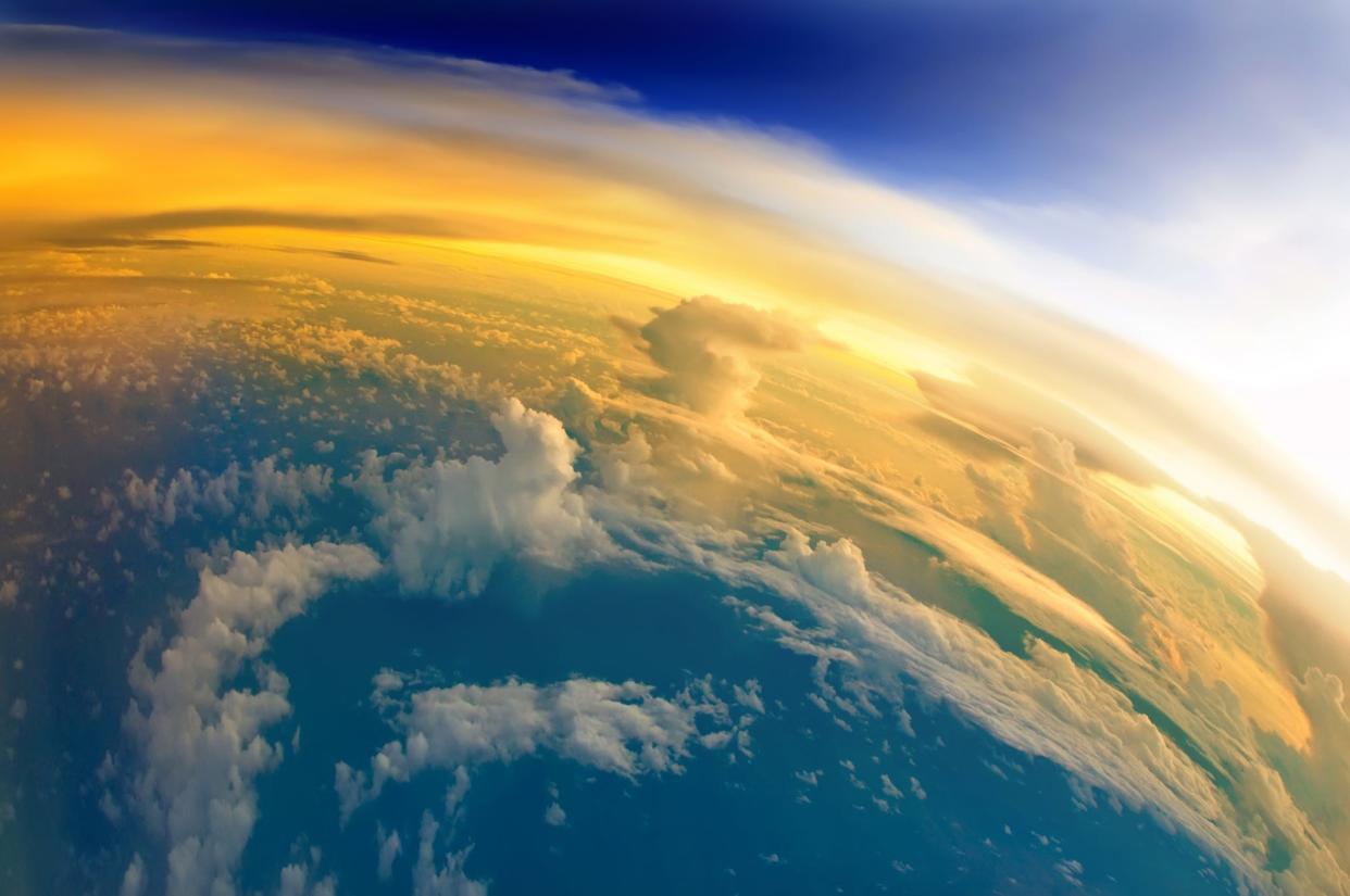 Aerial view of planet Earth covered in clouds.