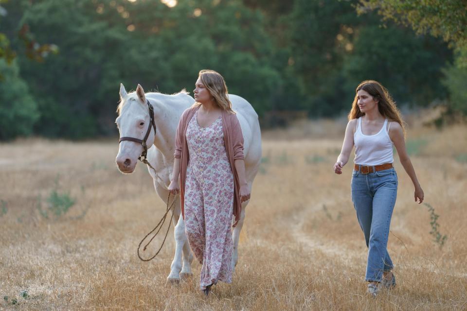 Kathryn Hahn in a scene from "Tiny Beautiful Things" with her onscreen mom, Merritt Wever.