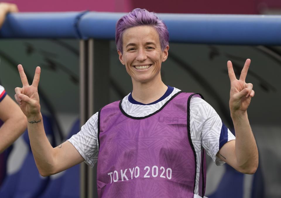 United States' Megan Rapinoe gives the victory sign before a women's soccer match against Sweden at the 2020 Summer Olympics, Wednesday, July 21, 2021, in Tokyo. (AP Photo/Ricardo Mazalan)