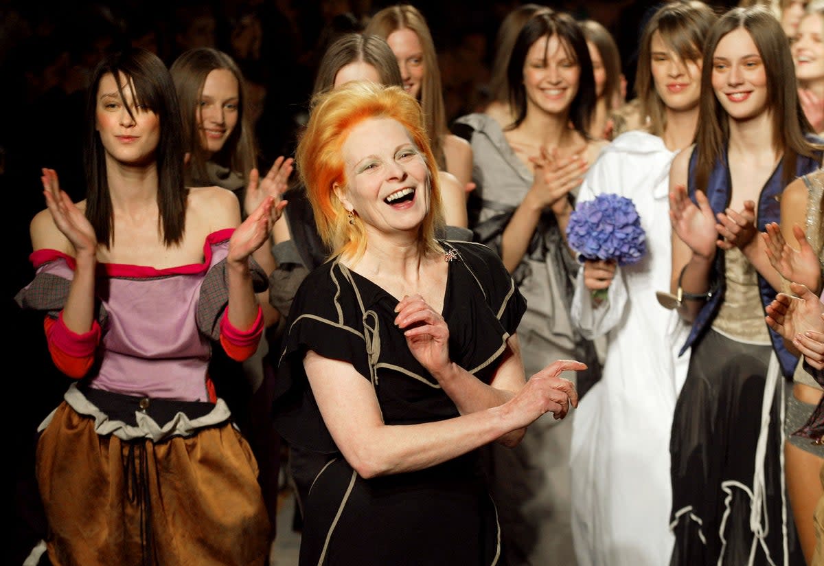 Vivienne Westwood acknowledges the audience after her show during the spring/summer 2003 ready-to-wear collections in Paris. - British fashion designer Vivienne Westwood died in London (AFP via Getty Images)