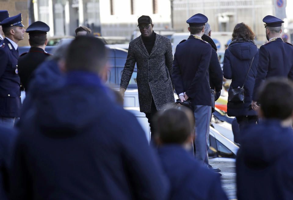 <p>Khouma Babacar arrives for the funeral ceremony of Italian player Davide Astori in Florence, Italy, Thursday, March 8, 2018. The 31-year-old Astori was found dead in his hotel room on Sunday after a suspected cardiac arrest before his team was set to play an Italian league match at Udinese. (AP Photo/Alessandra Tarantino) </p>