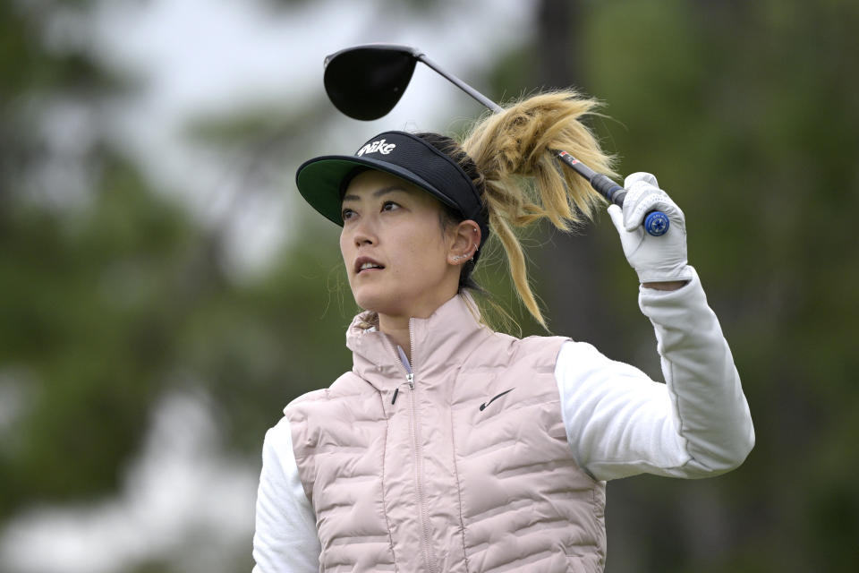 Michelle Wie West watches her tee shot on the 11th hole during the final round of the Tournament of Champions LPGA golf tournament, Sunday, Jan. 23, 2022, in Orlando, Fla. (AP Photo/Phelan M. Ebenhack)