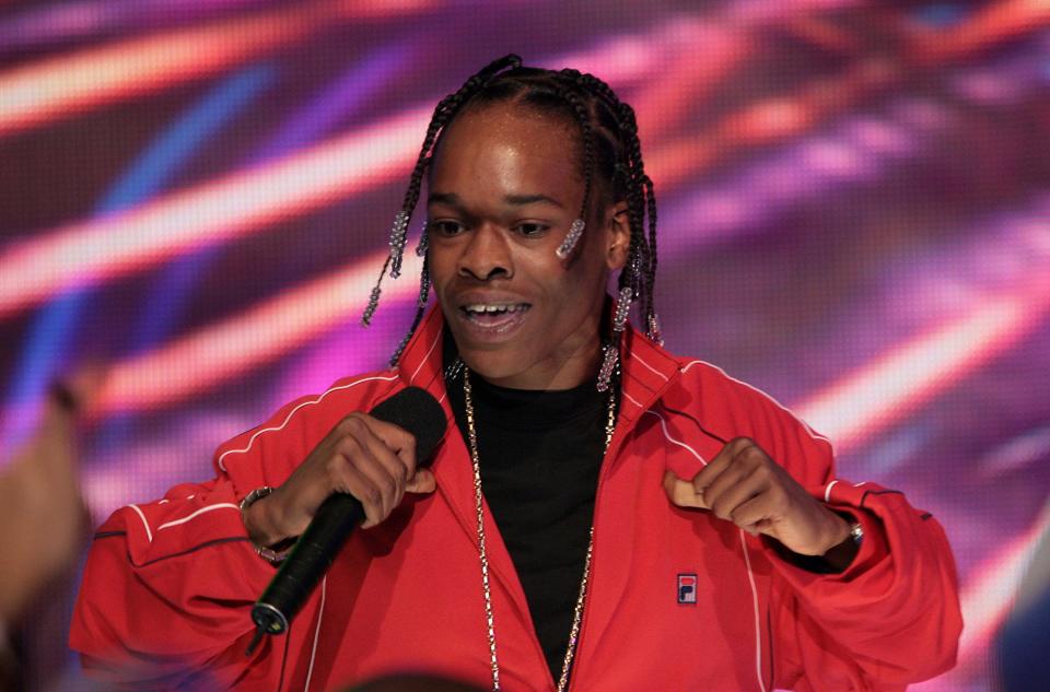 In this Dec. 11, 2007 file photo, rapper Hurricane Chris, born Christopher Dooley Jr., performs during a taping of BET's "106 and Park" New Year's Eve show in New York. The rapper says he's preparing to sue the Shreveport Police Department after being cleared of second degree murder charges earlier this year.